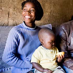 © 2012 Gloria Senaris, Courtesy of Photoshare. Mother and child in Zambia.