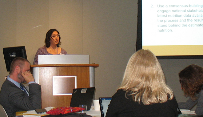 Kavita Sethuraman speaking at podium