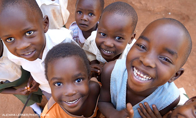 photo of five smiling kids