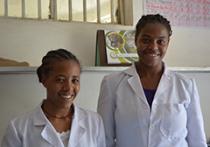 photo of two smiling health workers